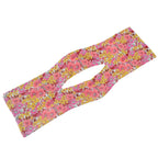 Designer floral Knotted Wire Headband, demonstrating its flexible wire for easy styling.