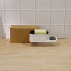 Different angle view of dish soap dispenser and sponge holder set