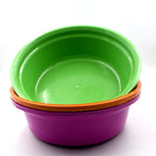 Lightweight plastic bowls stacked neatly, demonstrating space-saving storage.