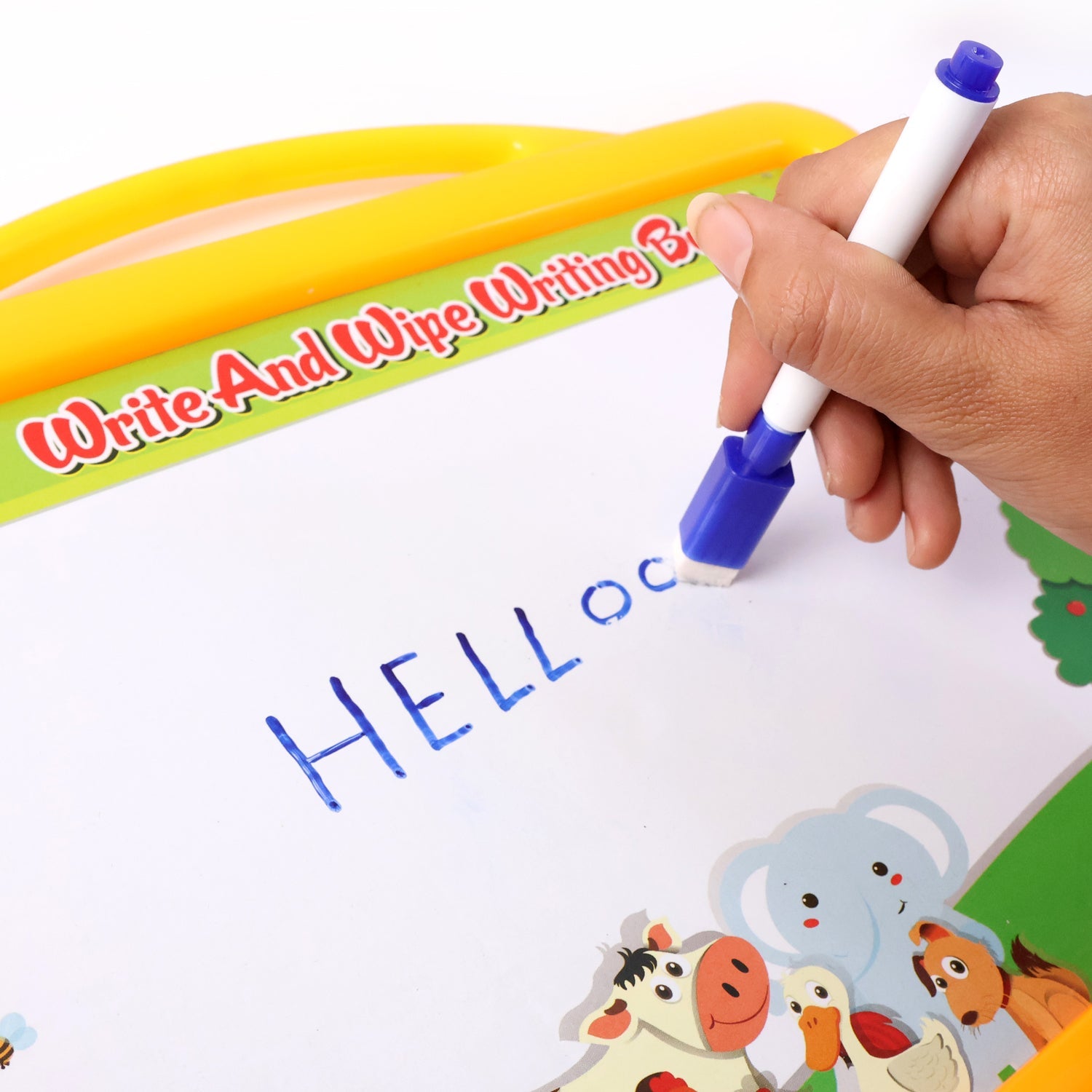 Magnetic alphabet and number pieces arranged on the kids double-sided writing board