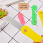 Arrangement of the 12-pack multicolour mini paper cutter knives, highlighting variety.
