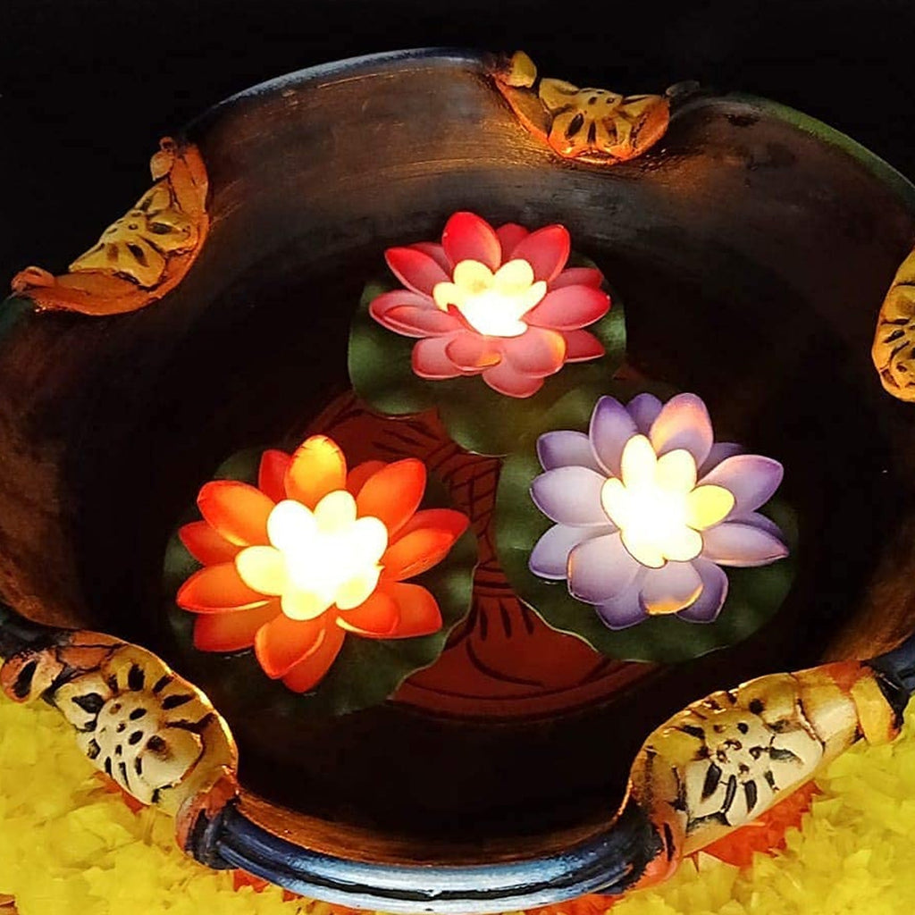 Assortment of vibrant Floating Lotus LED Candles ready for festive arrangements.