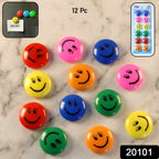 Colorful smiley face magnets used on office whiteboard