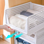 A foldable 3-layer clothes organizer, perfect for compact wardrobe storage in Indian homes.
