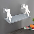 An elegant floating wall shelf in a modern living room, displaying decorative items.