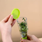 Innovative kitchen peeling tool with a clear view of its collection chamber.