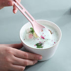 The components of the reusable cutlery set shown individually, emphasizing their practical design.