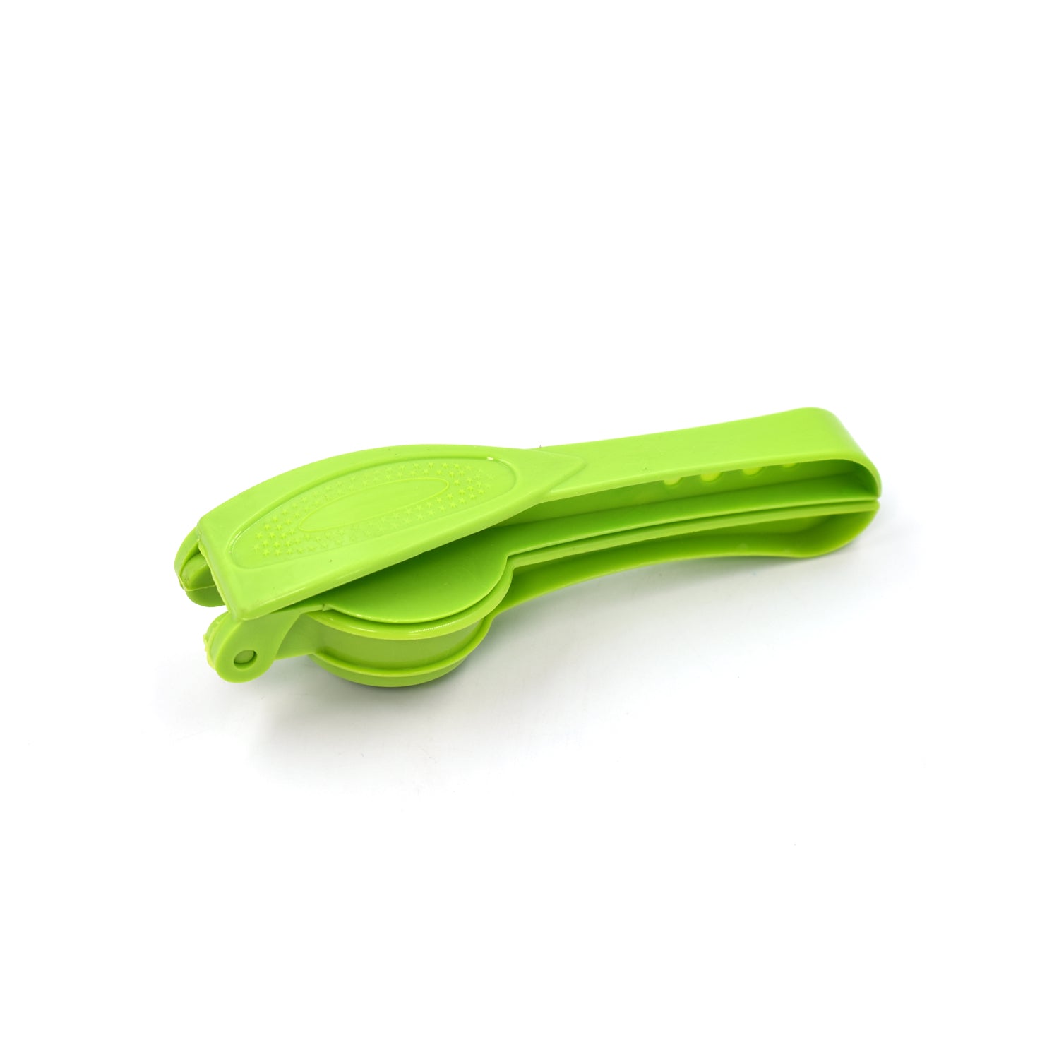 The compact plastic lemon squeezer and bottle opener placed on a clean kitchen surface.