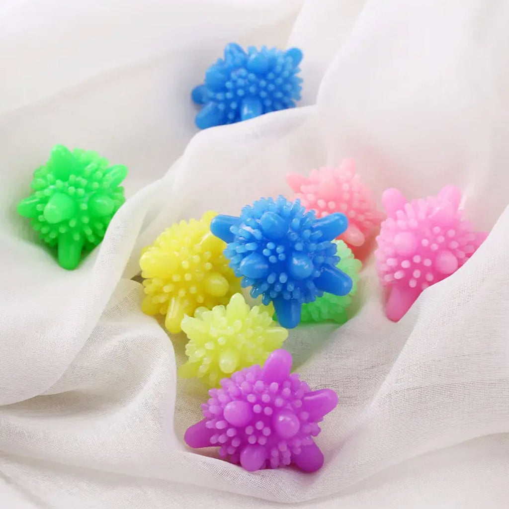 A set of ten colorful Laundry Dryer Balls, ready for use in your washing machine.