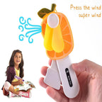 Mini hand pressure fan for kids showing safe spinning soft blades