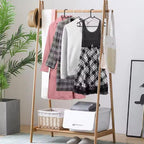 White plastic hanger holding a shirt to keep it wrinkle-free