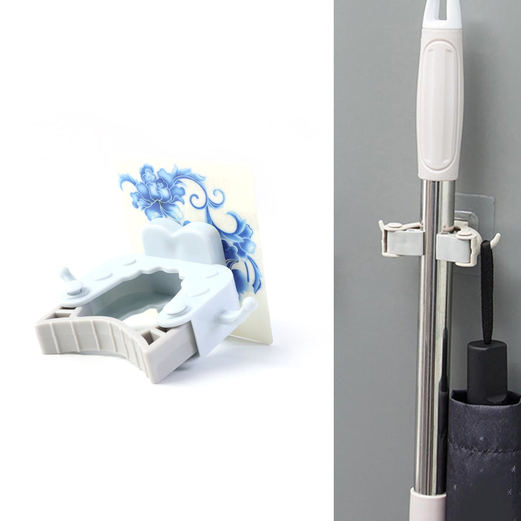 Mop holder clip mounted on wall holding mop handle securely