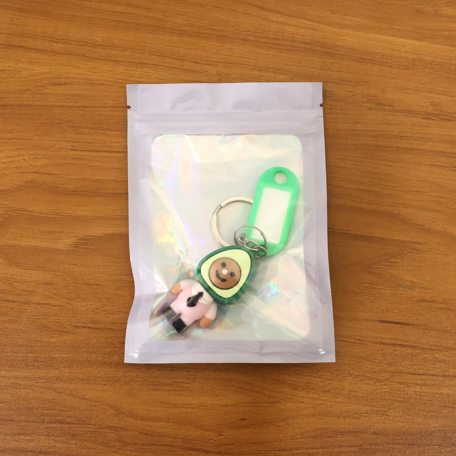 Adorable cartoon avocado keychain accessory perfect for backpacks and keys