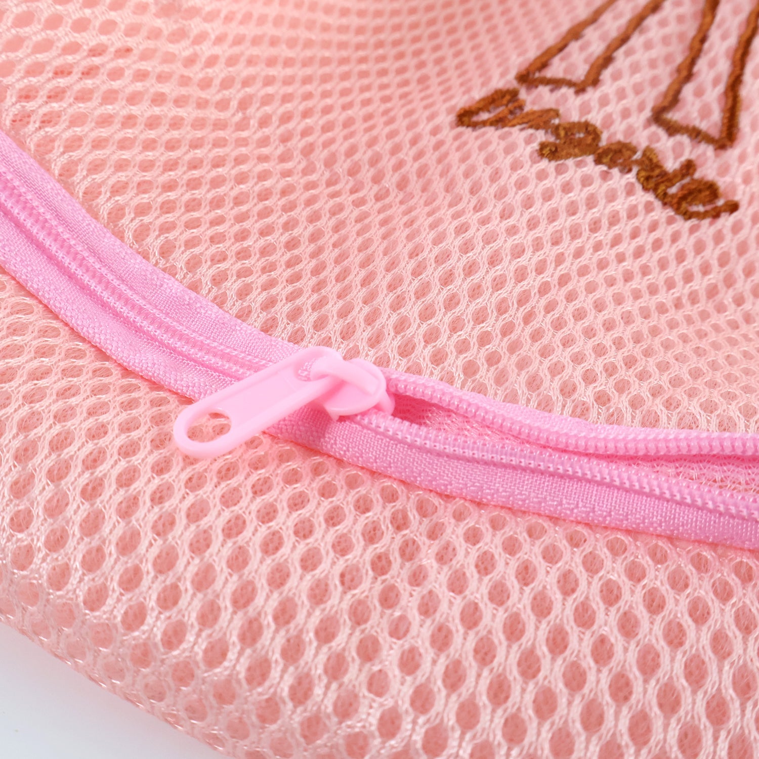 Mesh laundry bag cylindrical shape designed for pants and delicate clothes