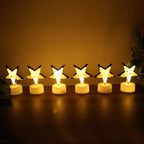 Battery operated star shaped LED candle with easy on/off switch at base