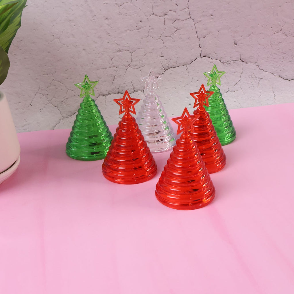 Close-up of LED Christmas tree decorative light showing cone design and star top