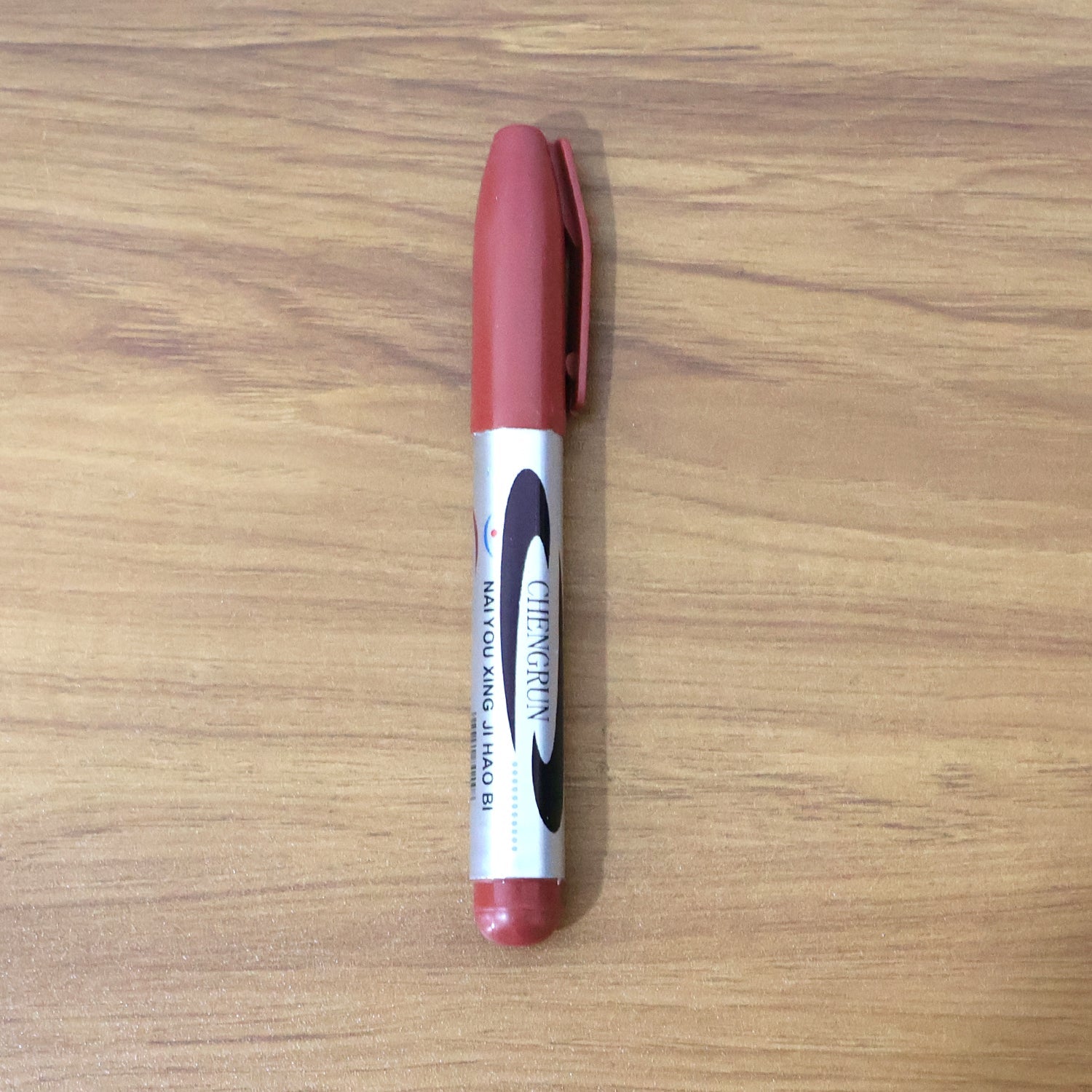 Packaged maroon permanent marker pen for office and school