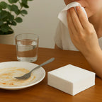 Set of disposable paper napkins arranged for a formal dining setting