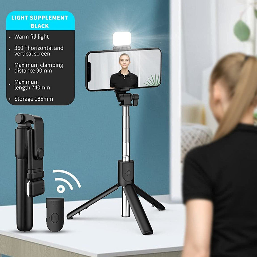 Extended selfie stick holding smartphone securely for wide angle selfies