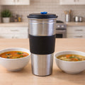 Stainless steel travel tumbler with insulated grip and leak-resistant lid