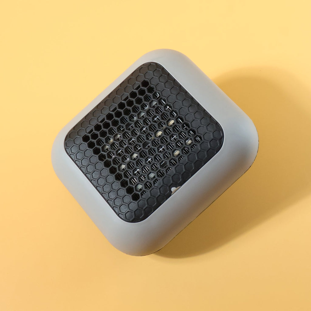 Close up of the heat output grill of the 600W compact electric wall heater