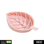 Decorative leaf-shaped soap dish with efficient water drainage.