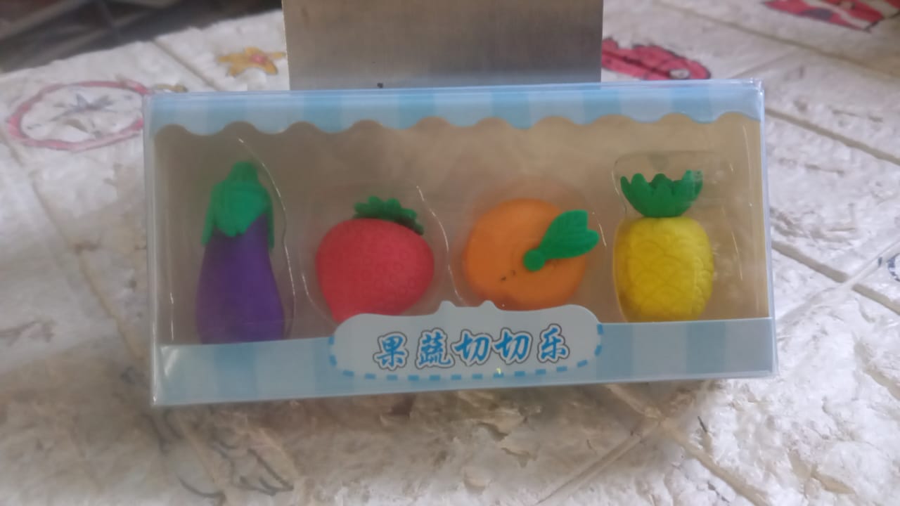 Assorted mini 3D fruit and vegetable erasers for kids' school supplies.