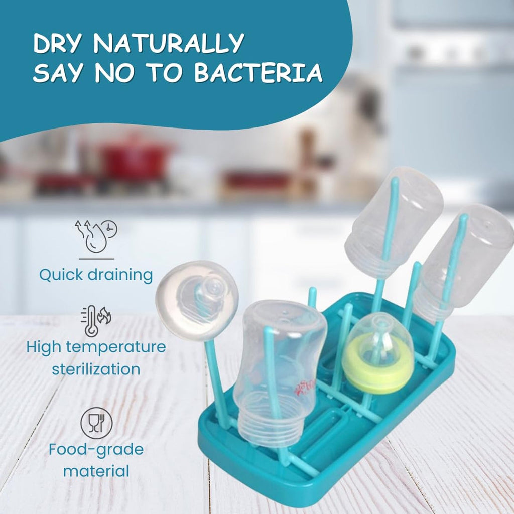 Baby feeding bottle drying rack featuring multiple holders for bottles and accessories