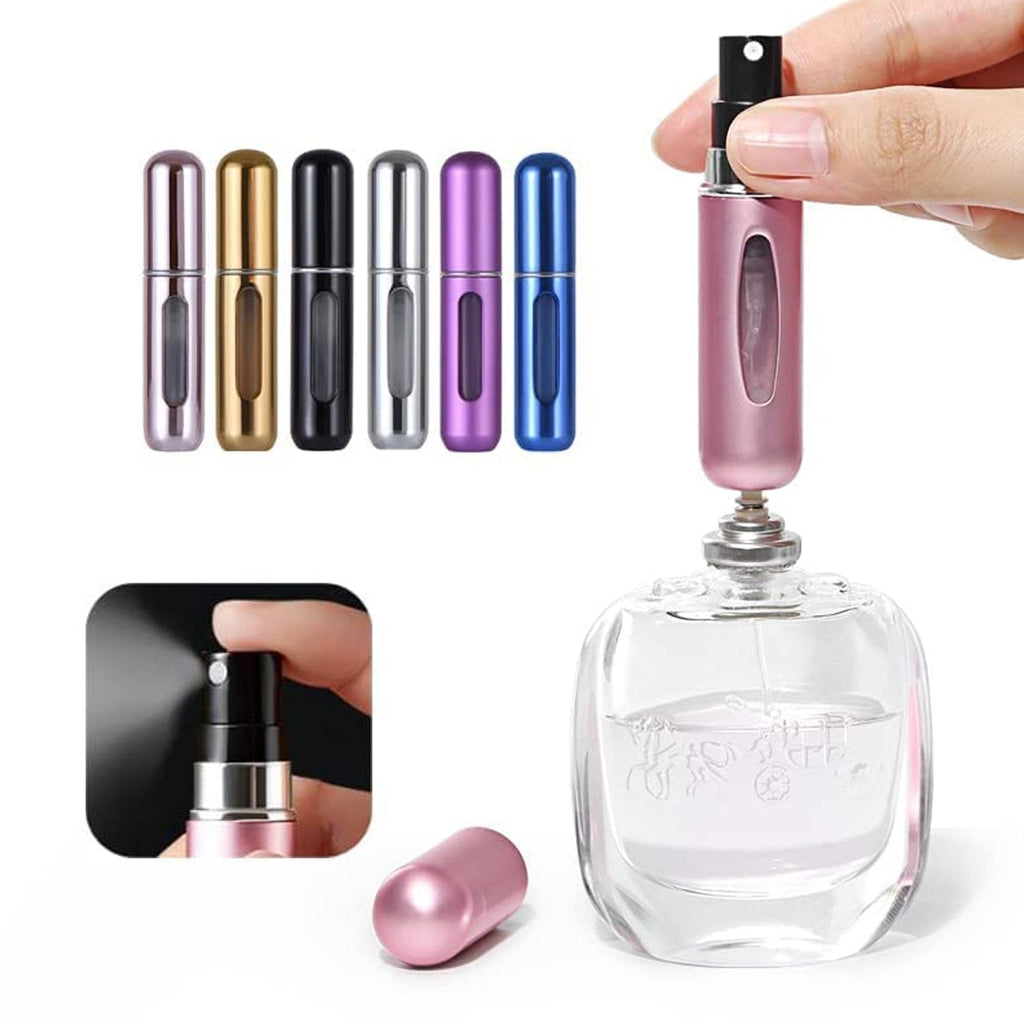 Assortment of colorful 5ml travel perfume atomizers, showcasing variety.