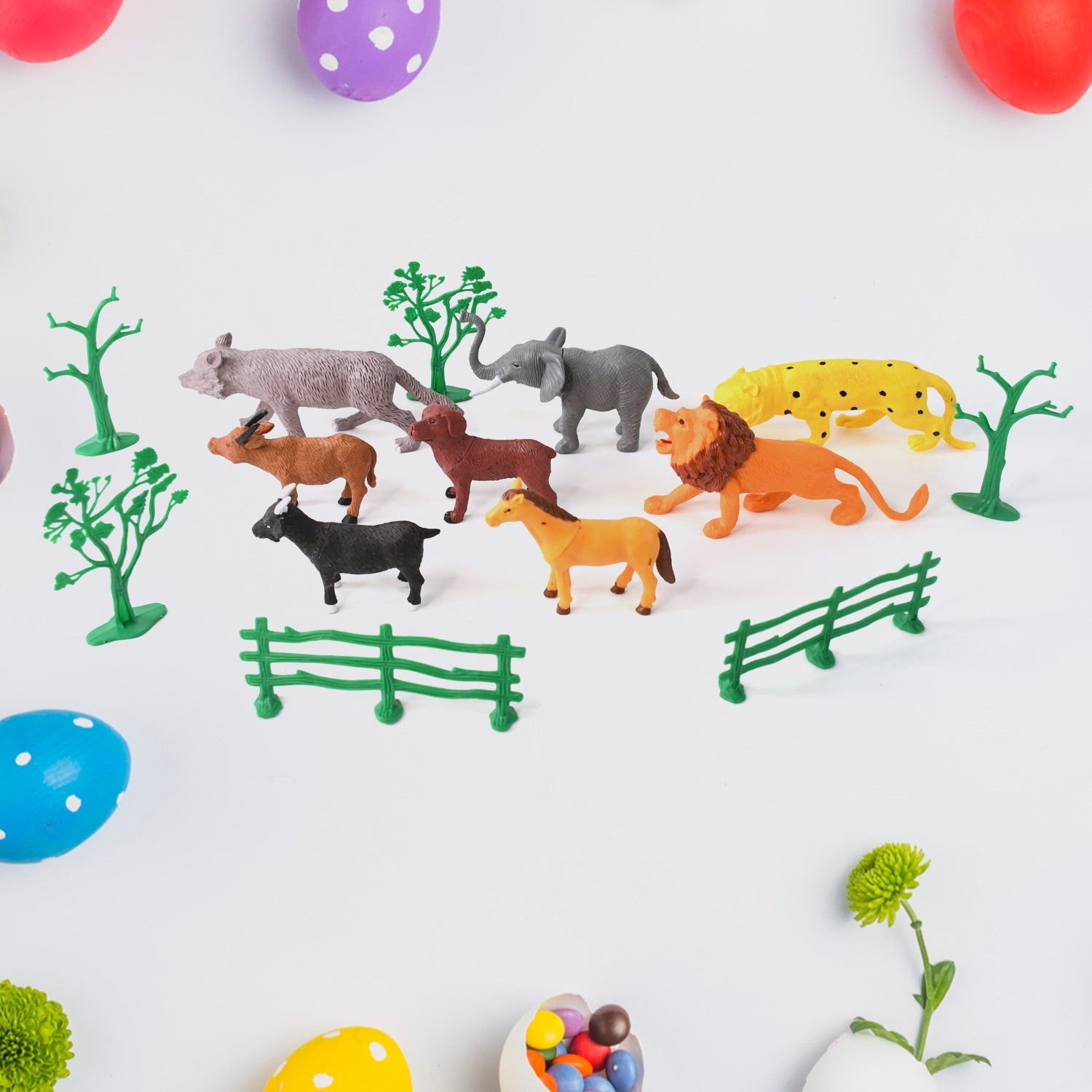 Child playing with Animal Kingdom 14-piece jungle safari toy set
