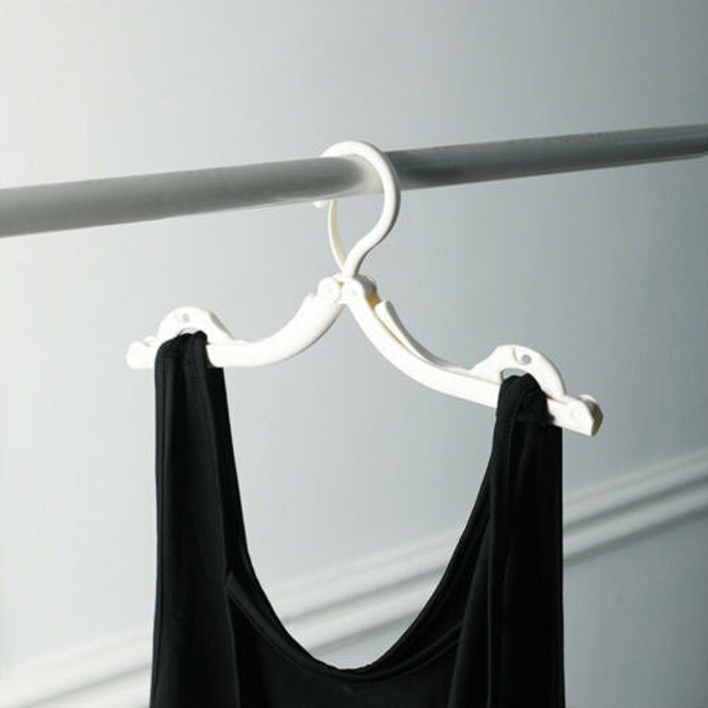 Compact foldable hangers suitable for a wide range of clothing, ideal for travel and home use.