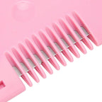 Heart-shaped baby hair scissors laid on a clean surface.