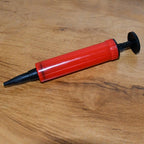 Portable manual air pump suitable for balloons and inflatables