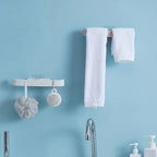 Clean and minimalist self-adhesive bathroom organizer installed seamlessly on a tiled wall.