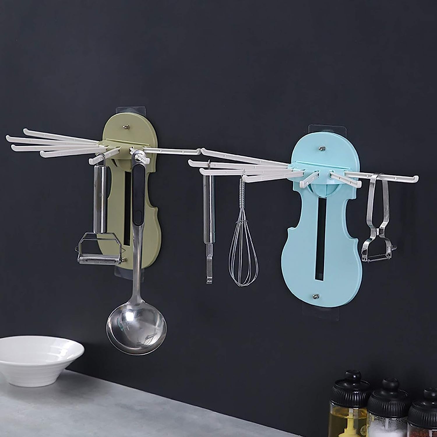 Detailed view of the push-up mechanism and hook rotation on the wall hanger.