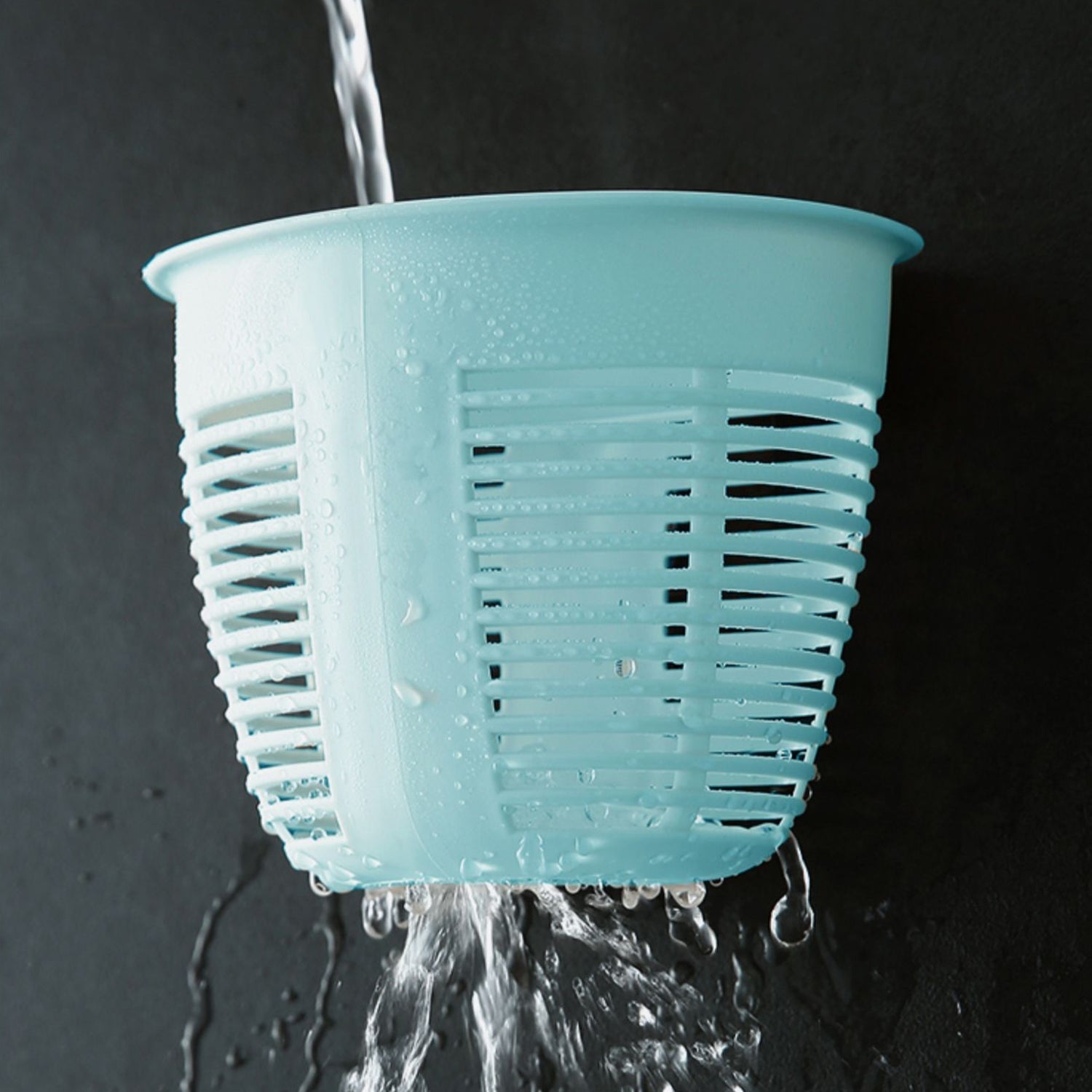 Collection of hanging plastic storage baskets in various colors, demonstrating versatility.
