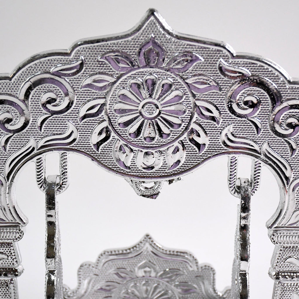 Elegant silver-coated Bal Gopal Jhula enhancing pooja room décor
