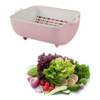 BPA-free double-layered strainer basket in action, draining water.