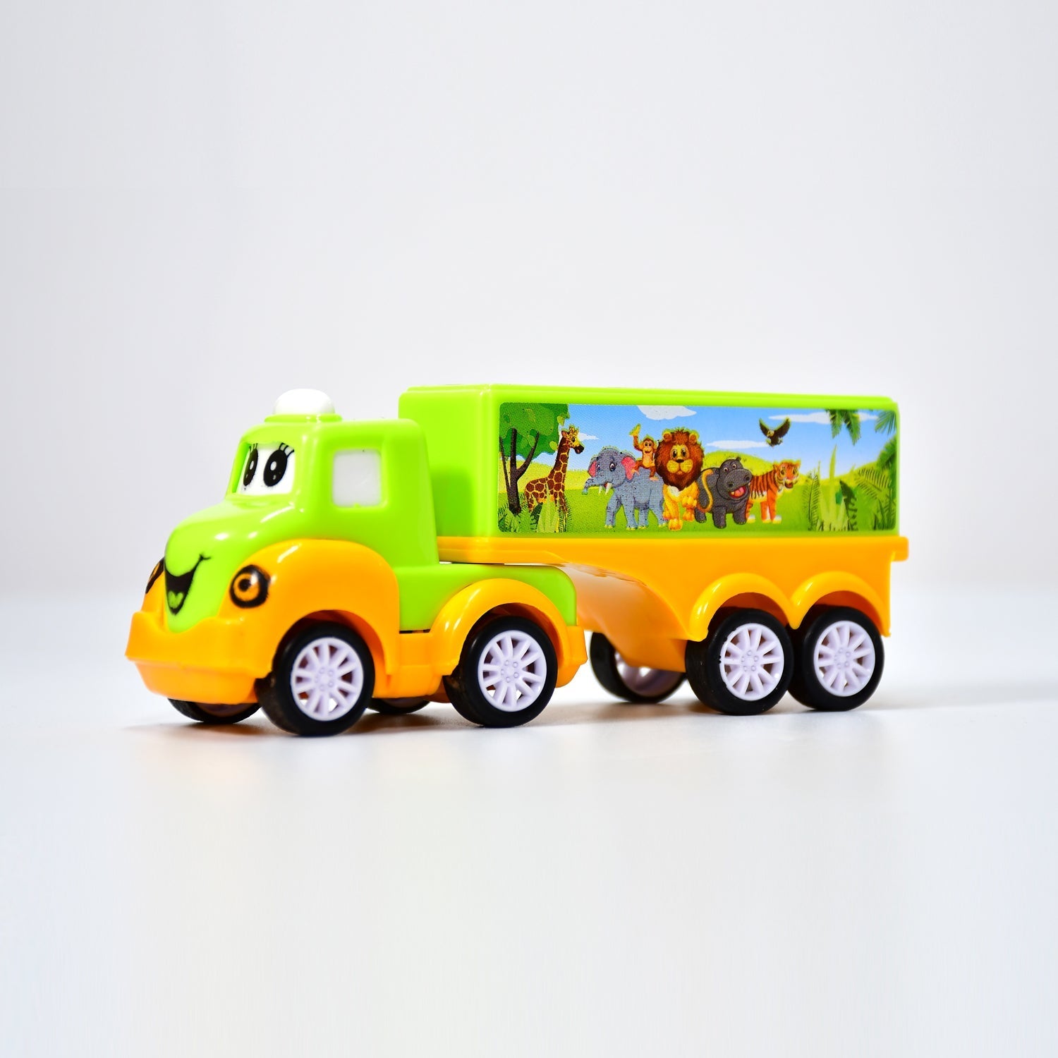 Close-up of the durable tires on the green and yellow toy truck.