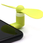 Compact Mini USB fan ideal for cooling at home or while traveling.