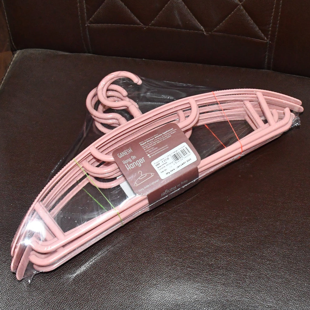 Compact plastic cloth hangers keeping clothes wrinkle-free and well arranged