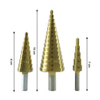 Detail of the hexagonal shank on a titanium-coated HSS steel step drill bit for secure grip.