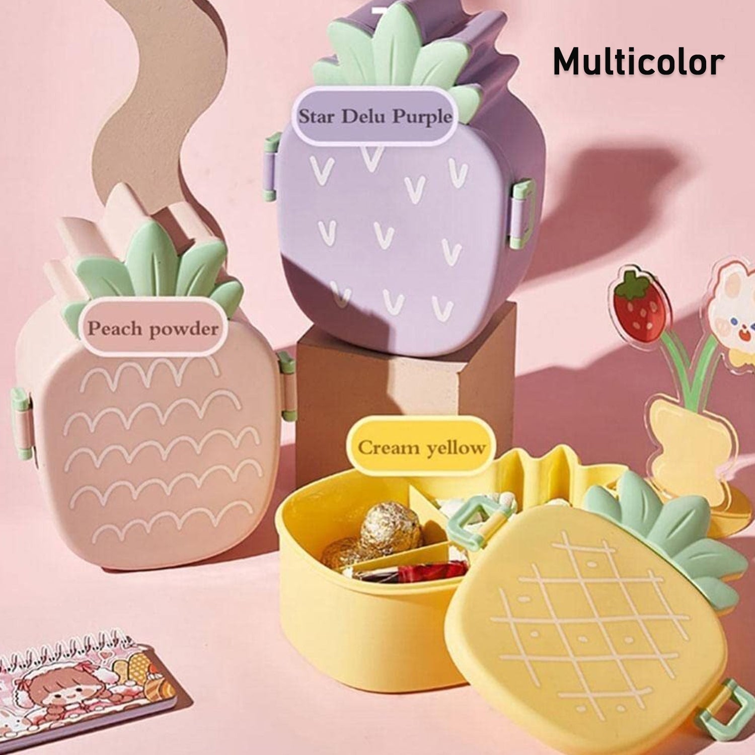 Pineapple kids' lunch box with secure clasps for leak-proof transport.