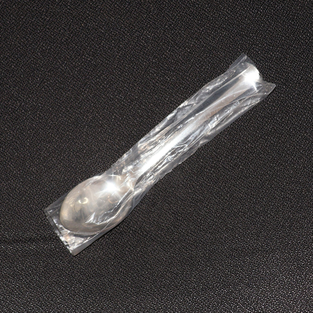 Stainless Steel Dining Spoon alongside other cutlery, ideal for home or café use.