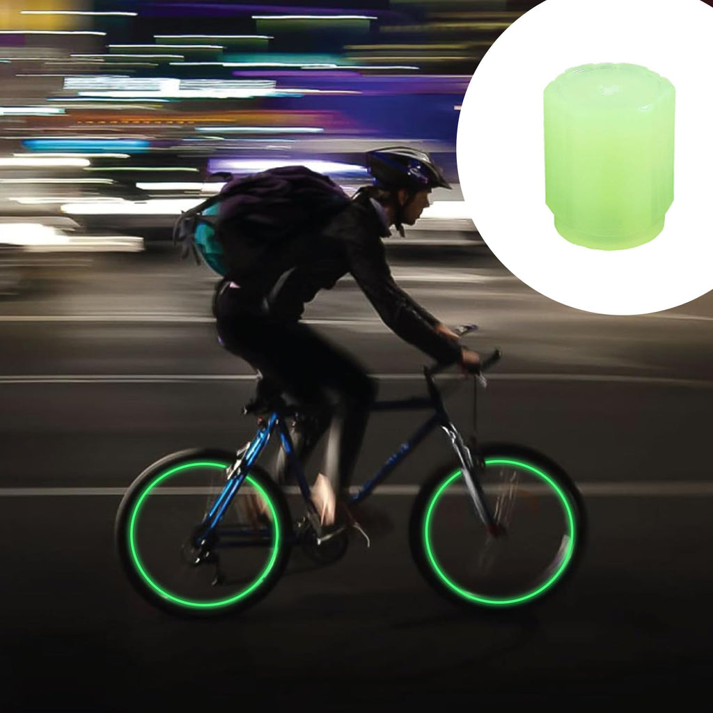 Tire gleam effect from luminous glow tyre valve caps on motorcycle wheels
