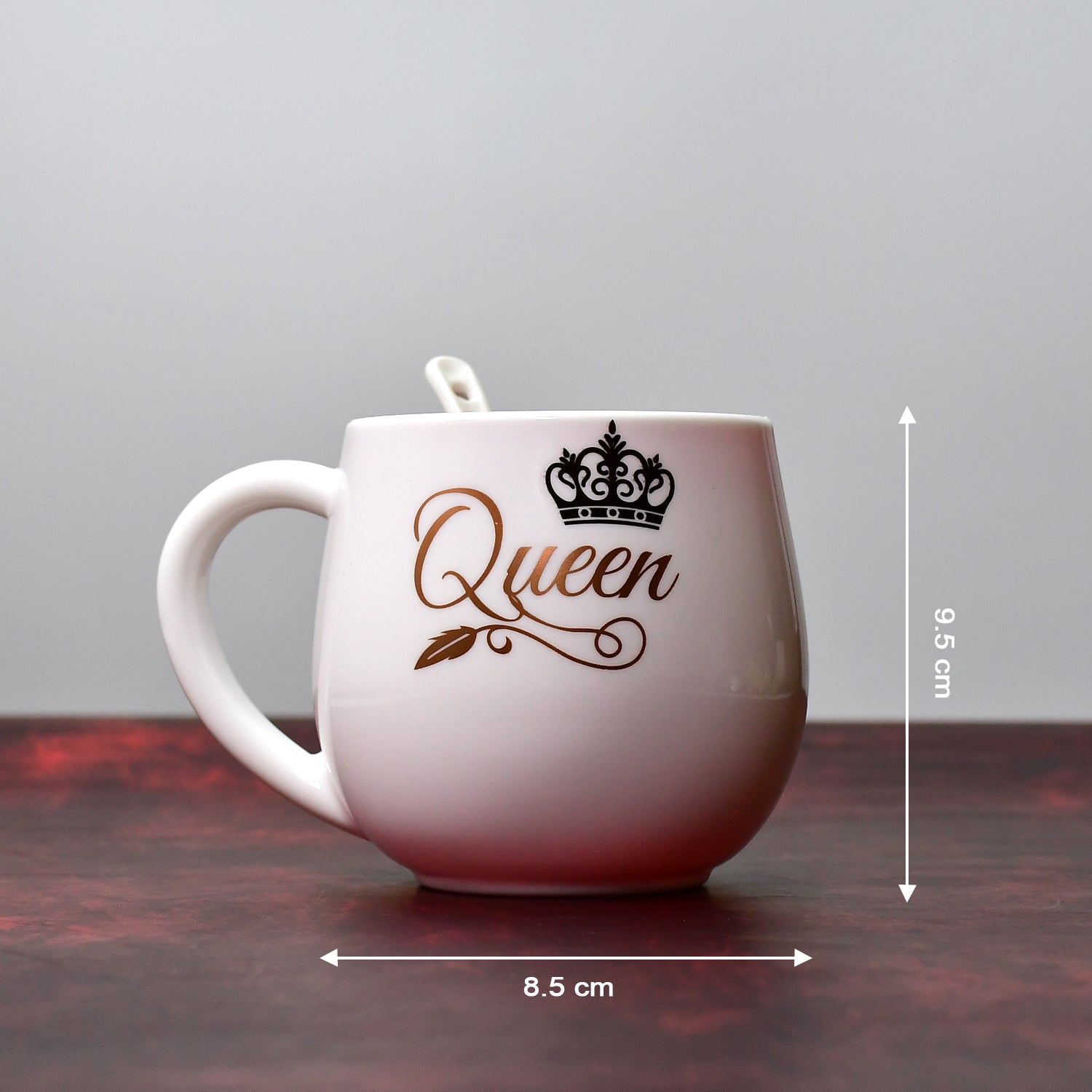 Boxed multi-design plastic mug with spoon, perfect for gifting.