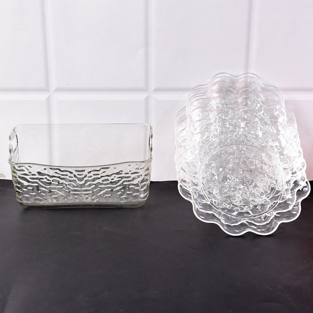 Elegant plastic bowls with textured finish arranged on serving tray