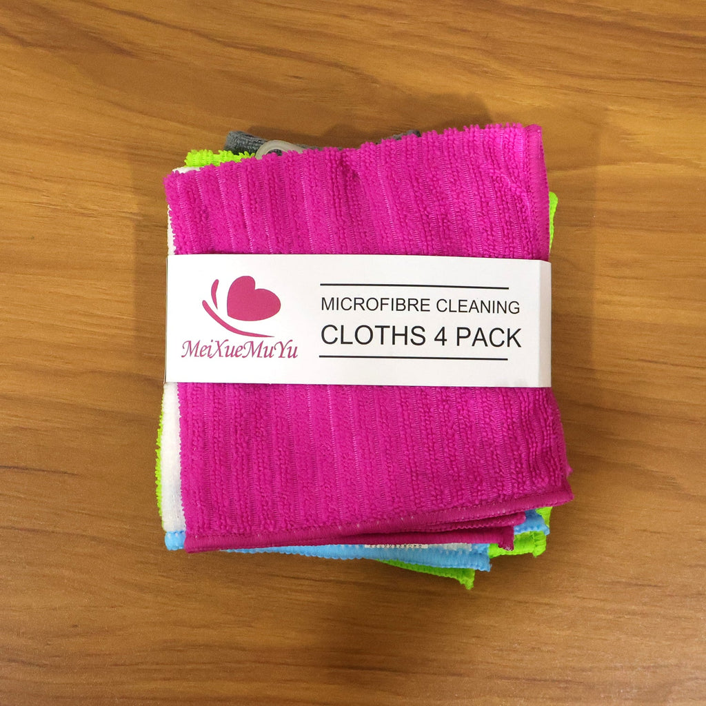 Microfiber cleaning cloth actively removing dust and dirt from surface