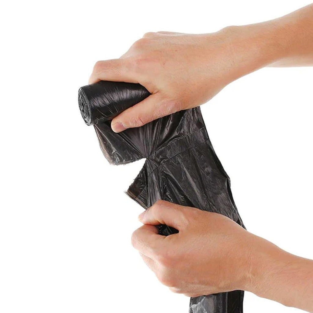 Black eco-friendly disposable garbage bags in use
