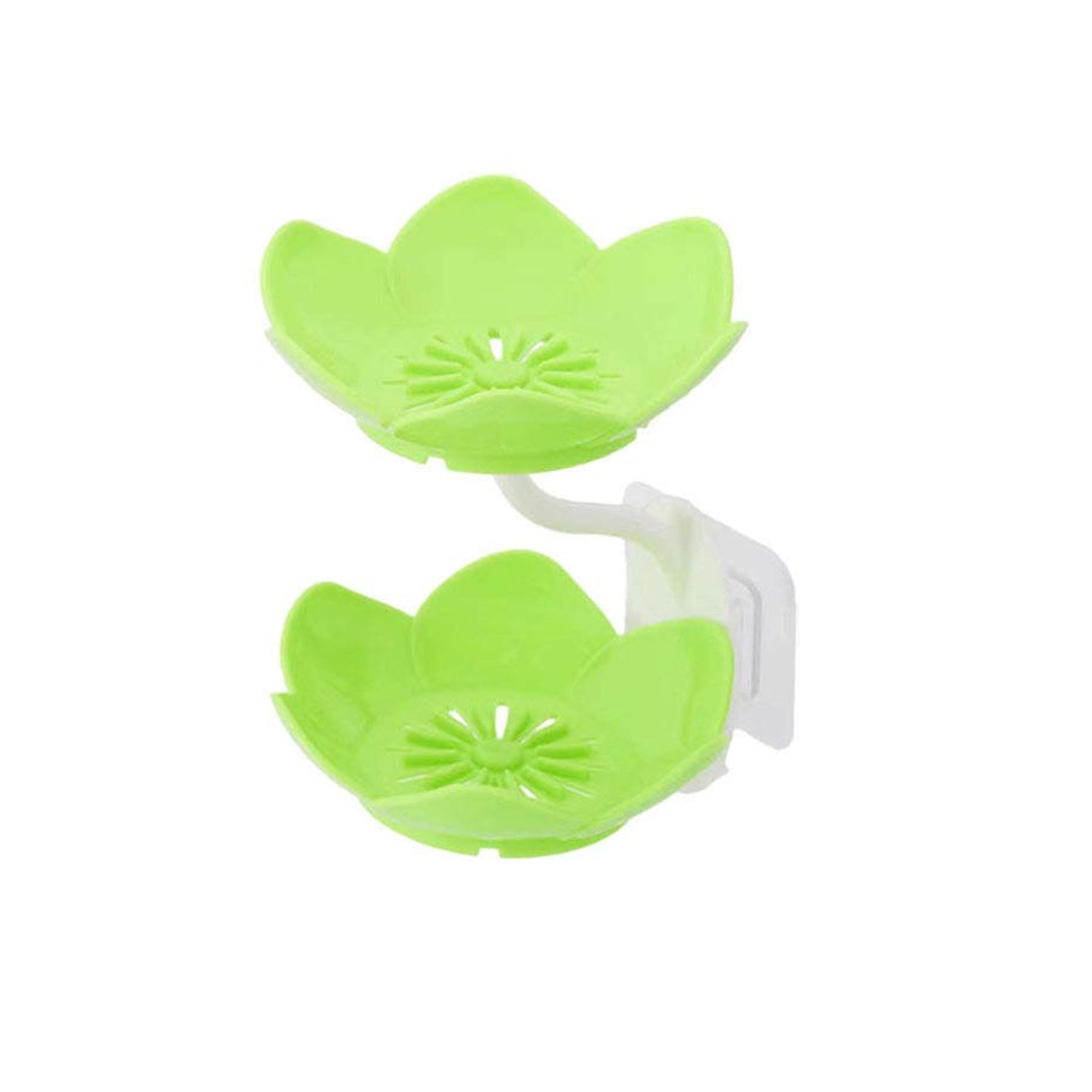Flower-shaped self-draining soap dish mounted on a bathroom wall with a soap bar.